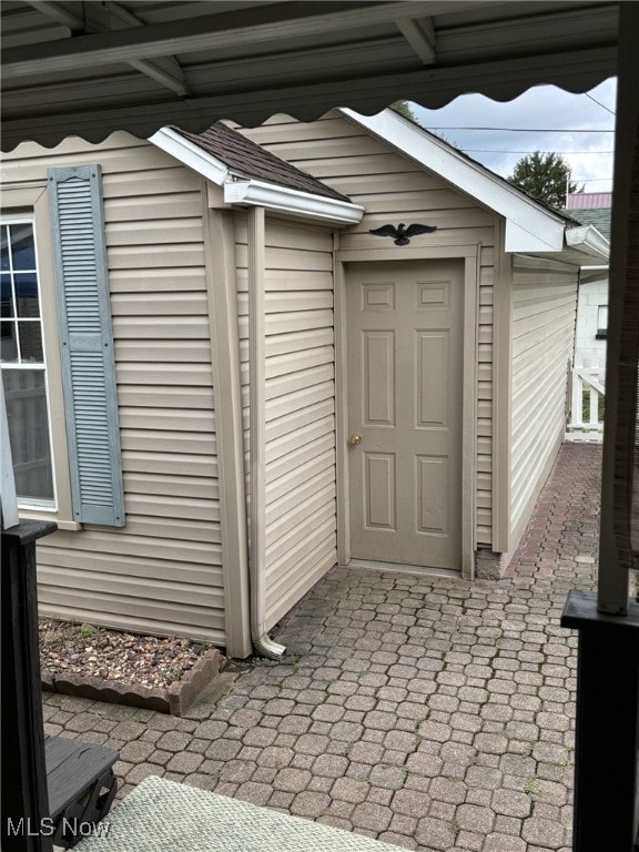 doorway to property featuring a patio