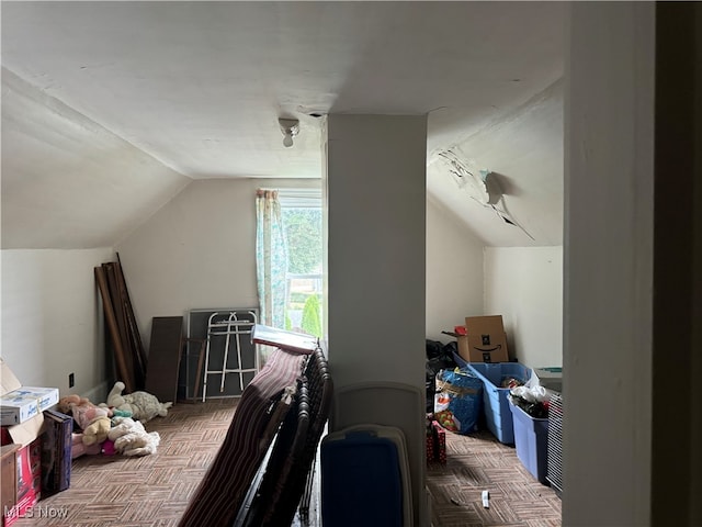 bonus room with vaulted ceiling