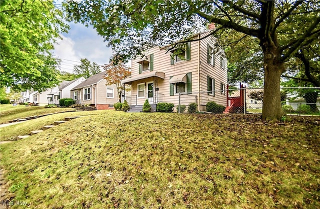 front of property featuring a front yard