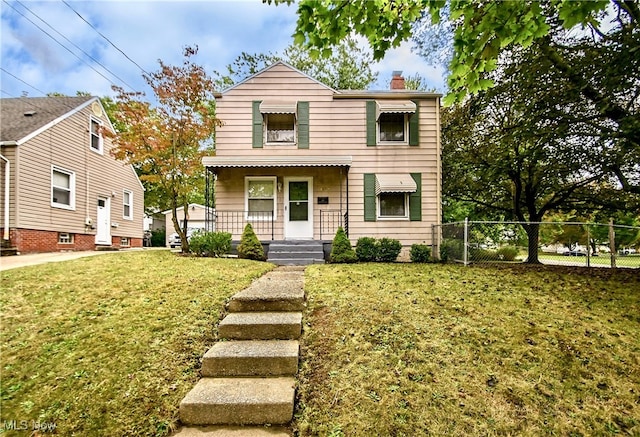 view of property featuring a front yard