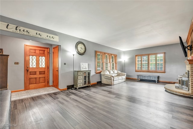 entryway with hardwood / wood-style flooring