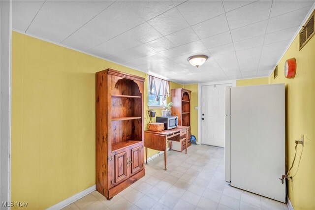 interior space featuring light tile patterned floors