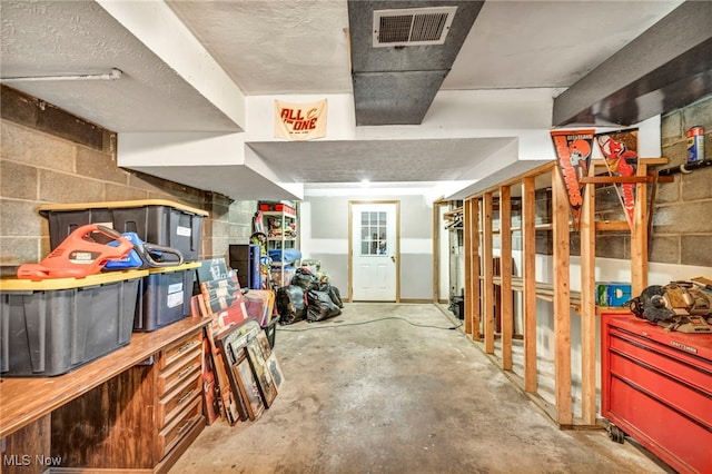 basement with a textured ceiling