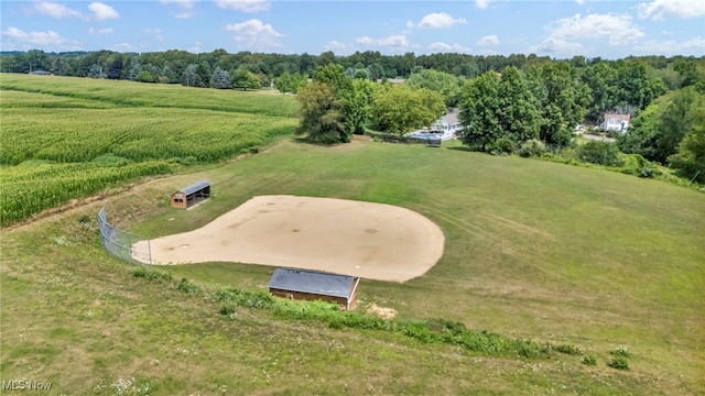 birds eye view of property featuring a rural view