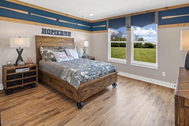 bedroom featuring hardwood / wood-style floors