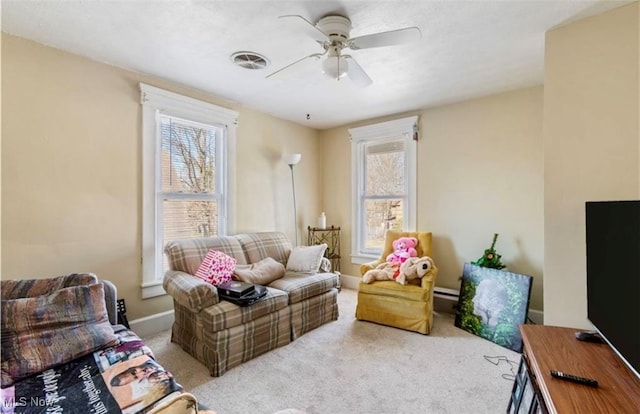 interior space with ceiling fan and plenty of natural light