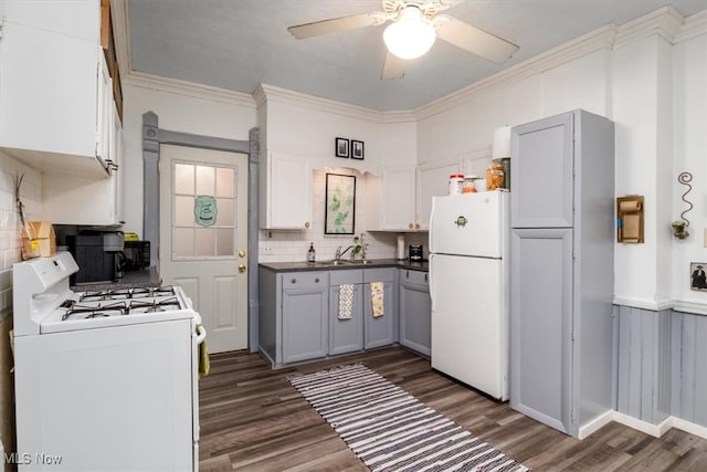 kitchen featuring gray cabinets, tasteful backsplash, ceiling fan, white appliances, and sink