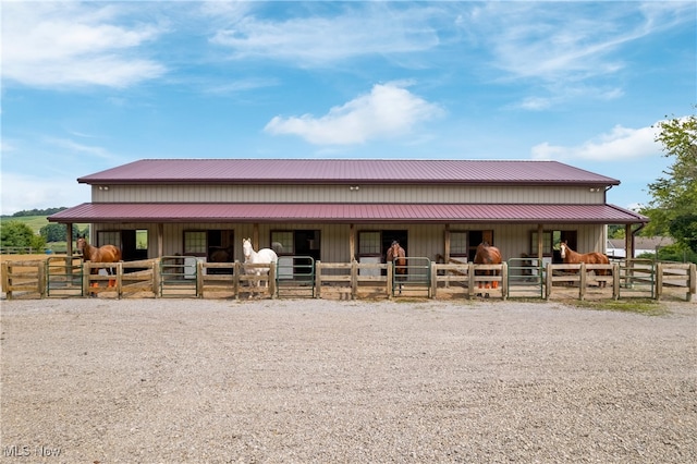 view of stable with an outbuilding