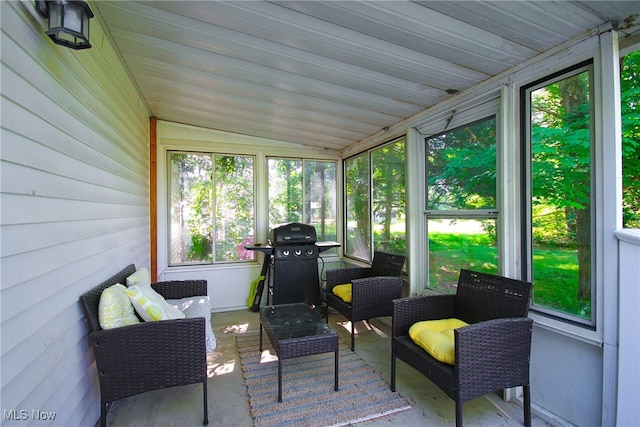 sunroom with lofted ceiling