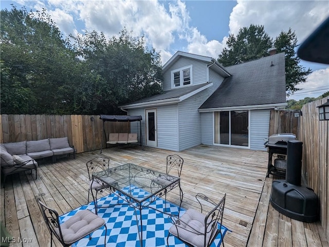 deck with fence and an outdoor hangout area