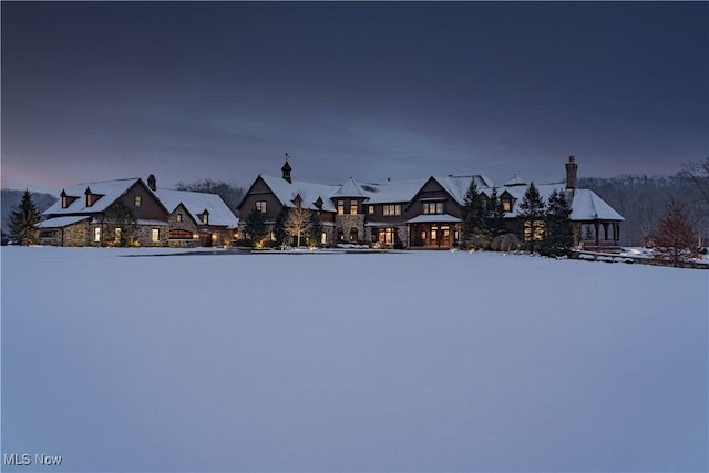 view of snow covered front of house