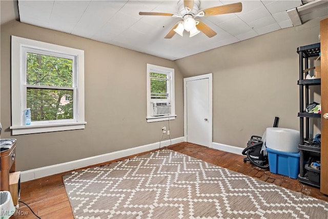 misc room featuring plenty of natural light, dark hardwood / wood-style flooring, and vaulted ceiling