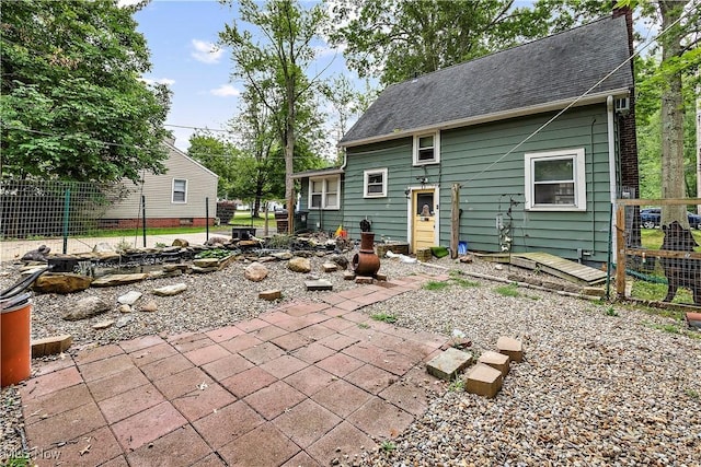 rear view of house featuring a patio area