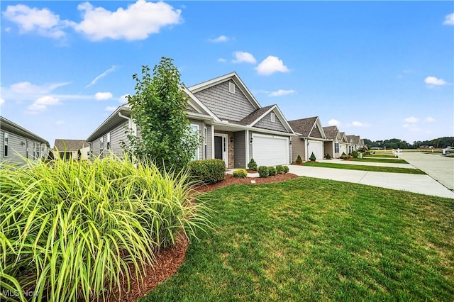 view of front facade featuring a front yard and a garage