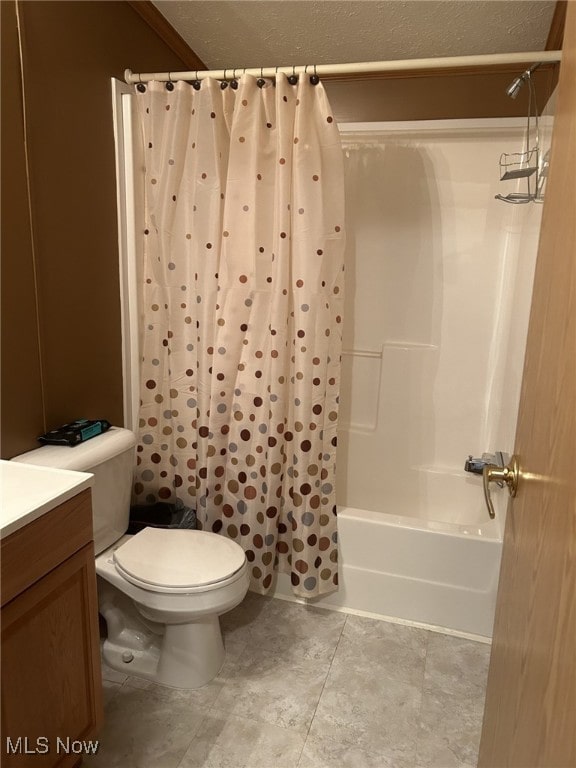 full bathroom featuring vanity, shower / bathtub combination with curtain, and toilet