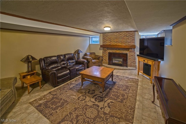 living room featuring a textured ceiling and a fireplace