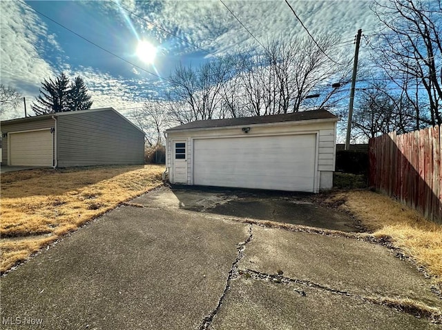 detached garage with fence