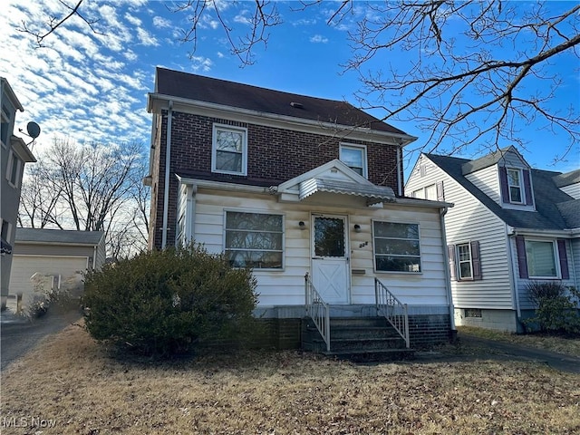 view of front of property featuring brick siding