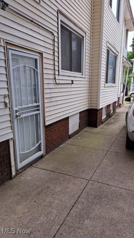 view of home's exterior with a patio