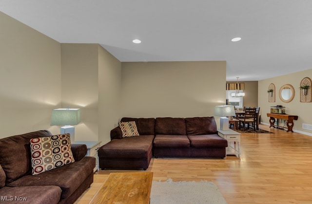 living room featuring light wood-type flooring