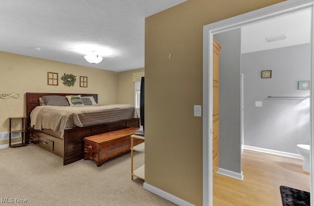 bedroom featuring light wood-type flooring