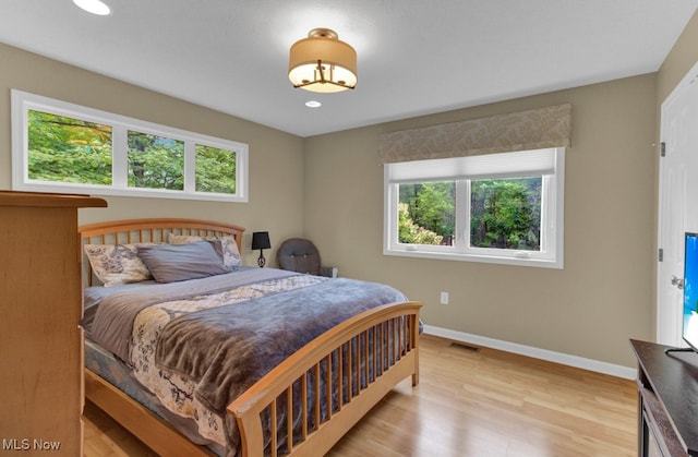 bedroom featuring light hardwood / wood-style floors