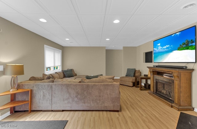 living room with light hardwood / wood-style floors