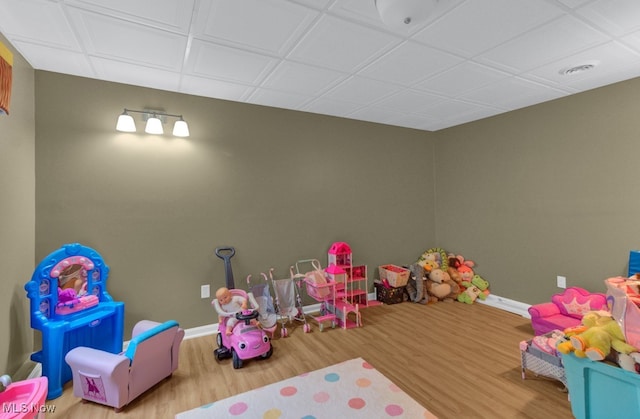 playroom with hardwood / wood-style flooring