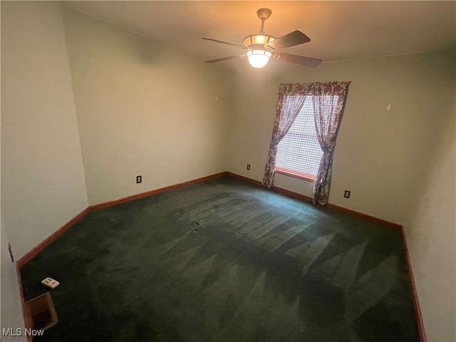 unfurnished room featuring carpet flooring and ceiling fan