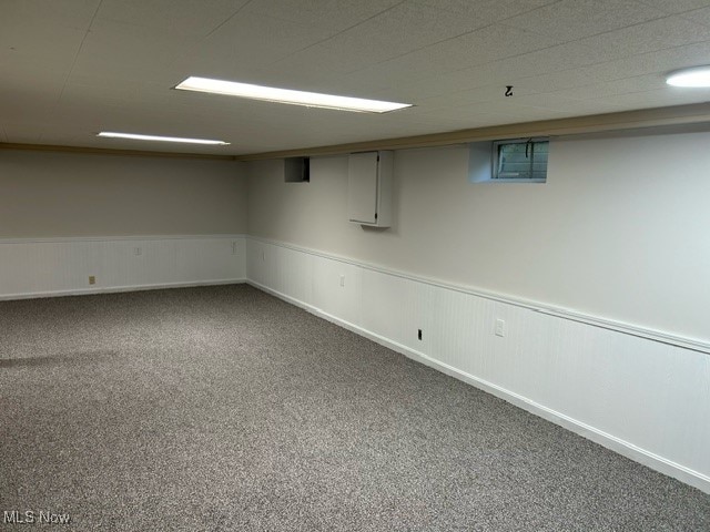 basement with carpet flooring