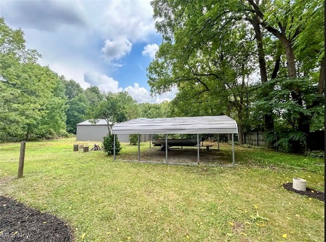 view of yard with a carport