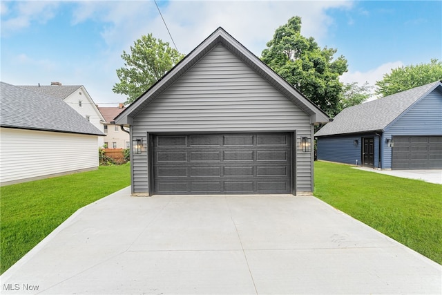 garage with a yard