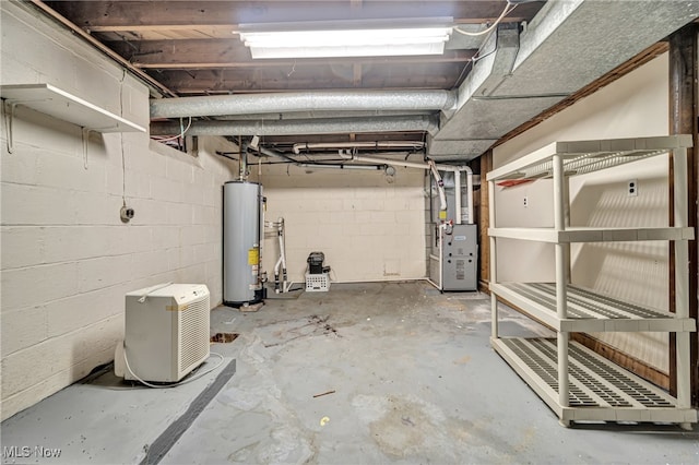 basement with gas water heater and heating unit