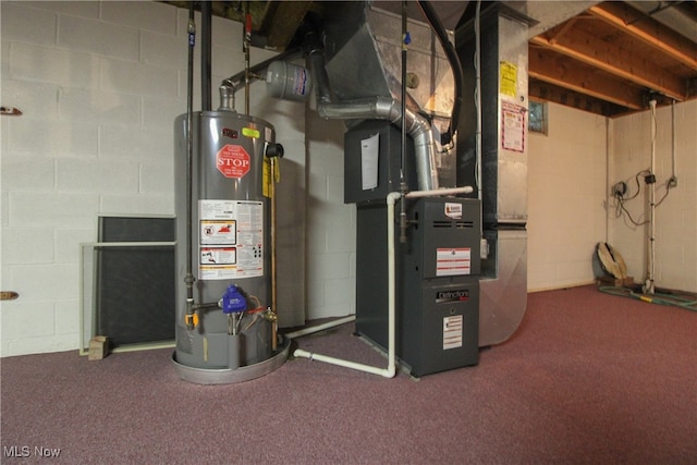 utility room featuring gas water heater