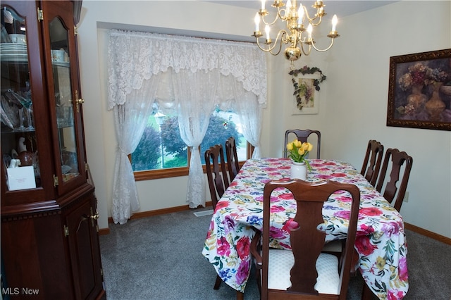 carpeted dining area with a chandelier