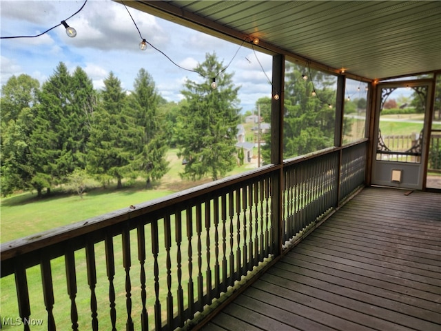 wooden deck with a yard