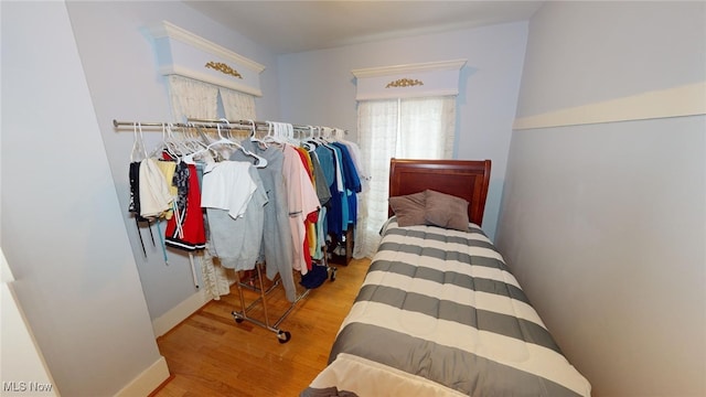 bedroom with light wood-type flooring