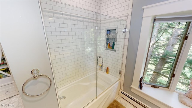 bathroom with baseboard heating and combined bath / shower with glass door