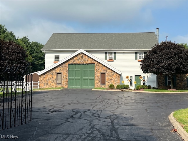 view of front of home featuring a garage