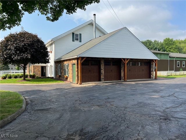 view of home's exterior featuring a garage