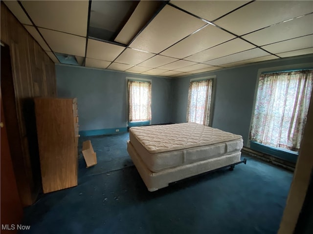 bedroom featuring a paneled ceiling