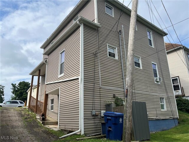 view of property exterior featuring cooling unit