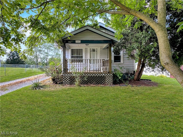 bungalow-style home featuring a front yard and a porch