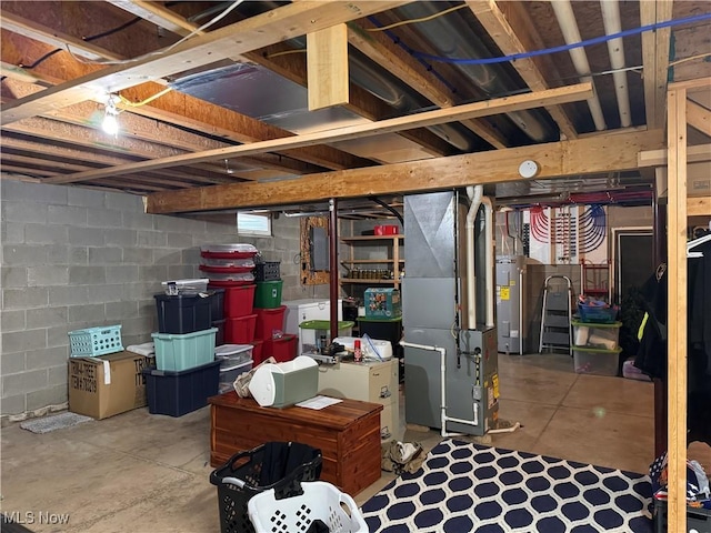 basement with heating unit and water heater