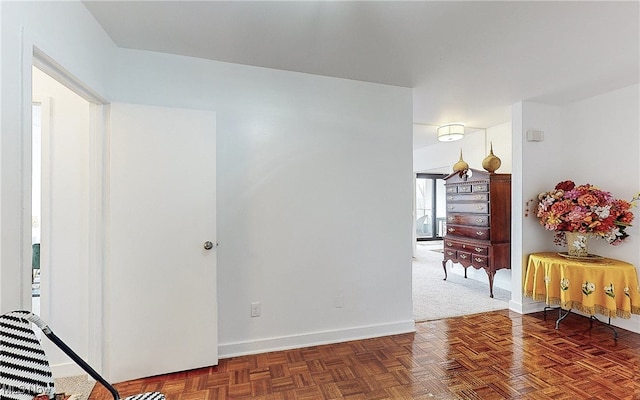 interior space featuring parquet flooring