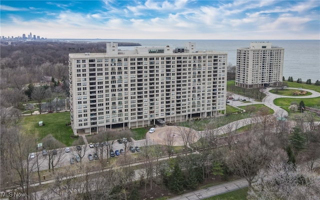 birds eye view of property with a water view