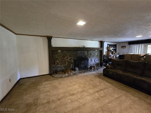 unfurnished living room featuring a fireplace, a textured ceiling, and carpet