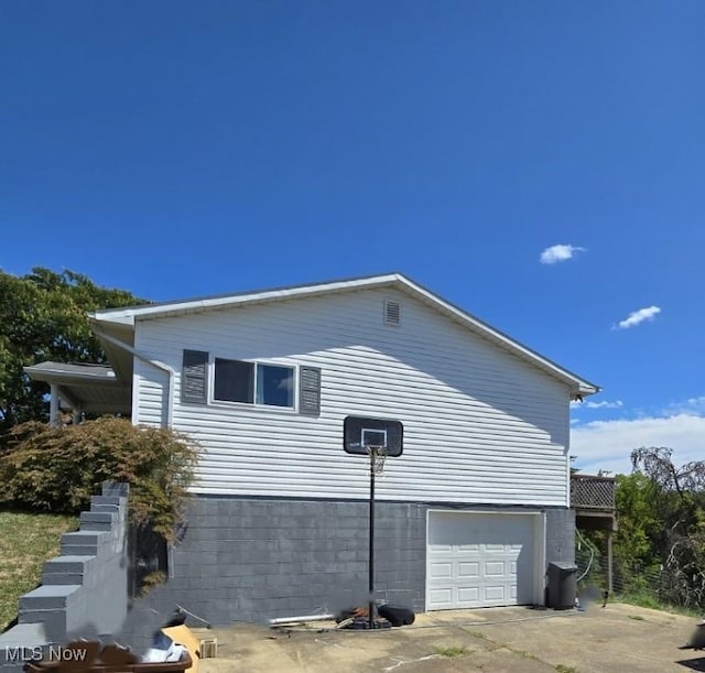 780 Mcgill Rd, Vincent, OH 45784 - view of side of property featuring an attached garage