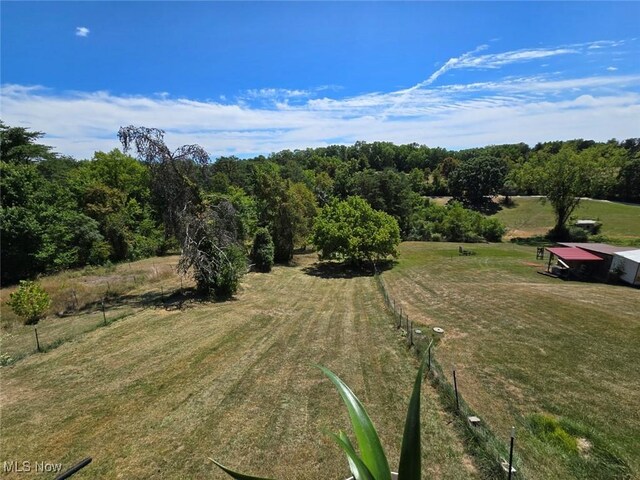 birds eye view of property featuring a rural view