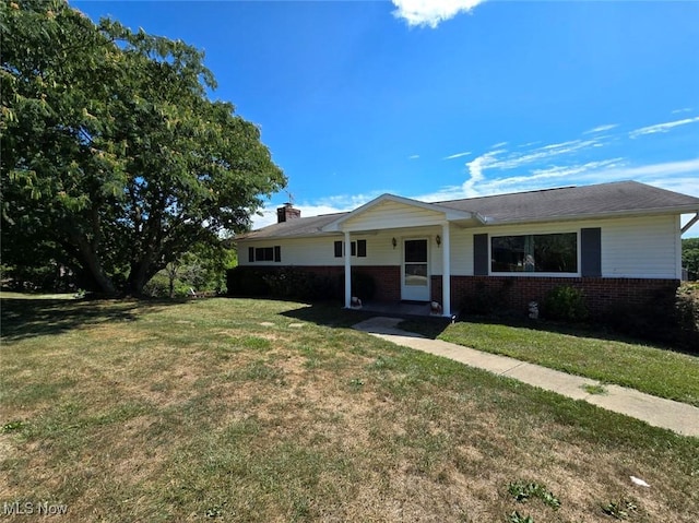 ranch-style home with a front yard